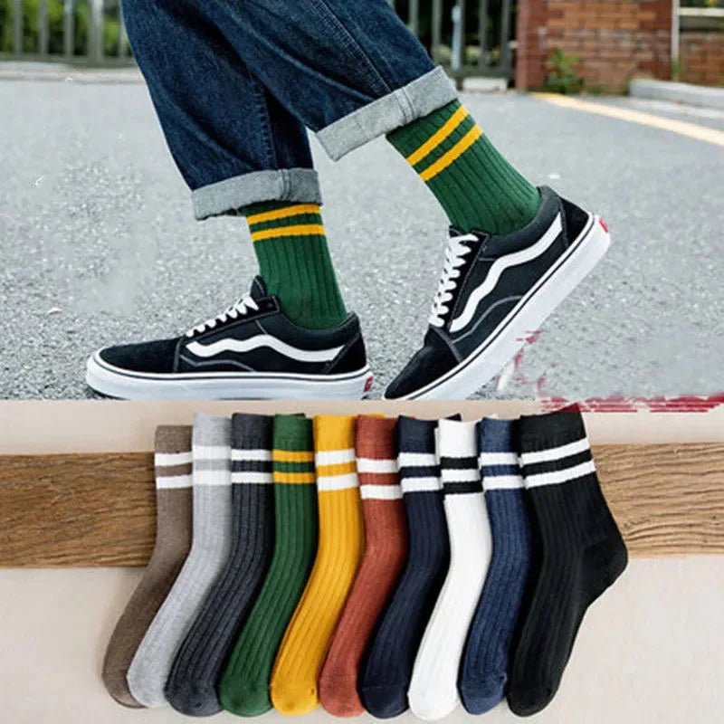 Set of five men’s vintage-style athletic socks in warm colors, ideal for fall and winter fashion and everyday comfort.
