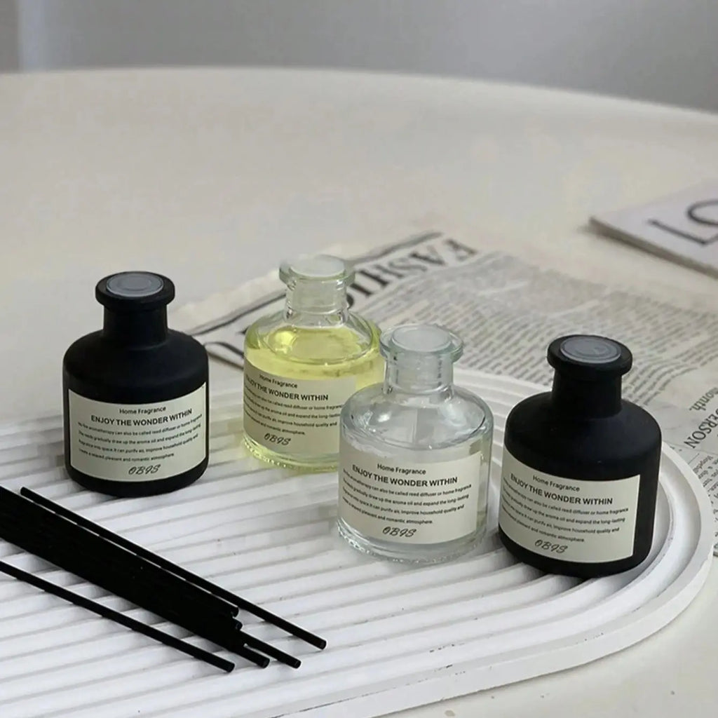 50ml reed diffuser with freesia and jasmine fragrance oil, including natural reed sticks for flameless and elegant home air freshening.