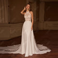 Elegant satin wedding dress featuring a halter neck and detailed lace appliques, perfect for a romantic and modern bridal look.