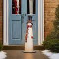Festive snowman Christmas statue used for indoor and outdoor holiday decoration, perfect for seasonal home décor or gifting.  