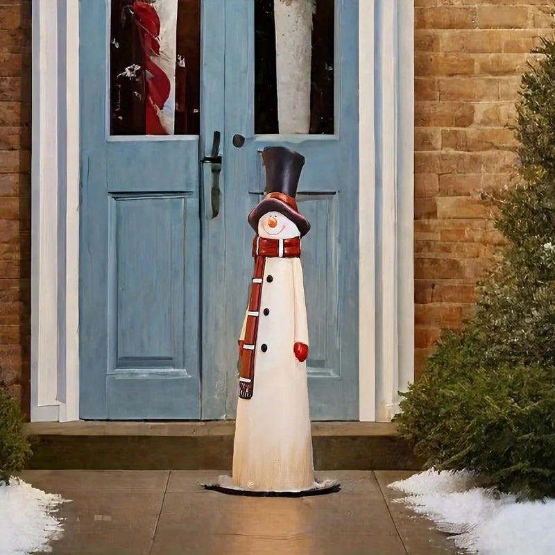 Festive snowman Christmas statue used for indoor and outdoor holiday decoration, perfect for seasonal home décor or gifting.  